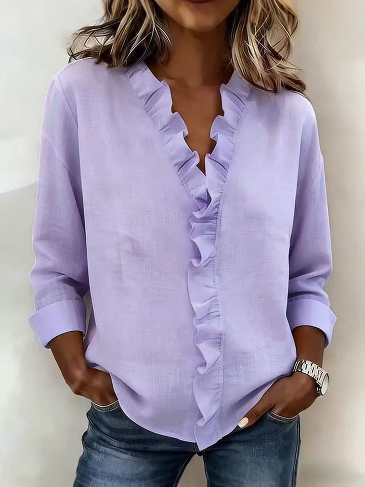 Chiara™ | Blouse with a V-neckline and delicate ruffle details