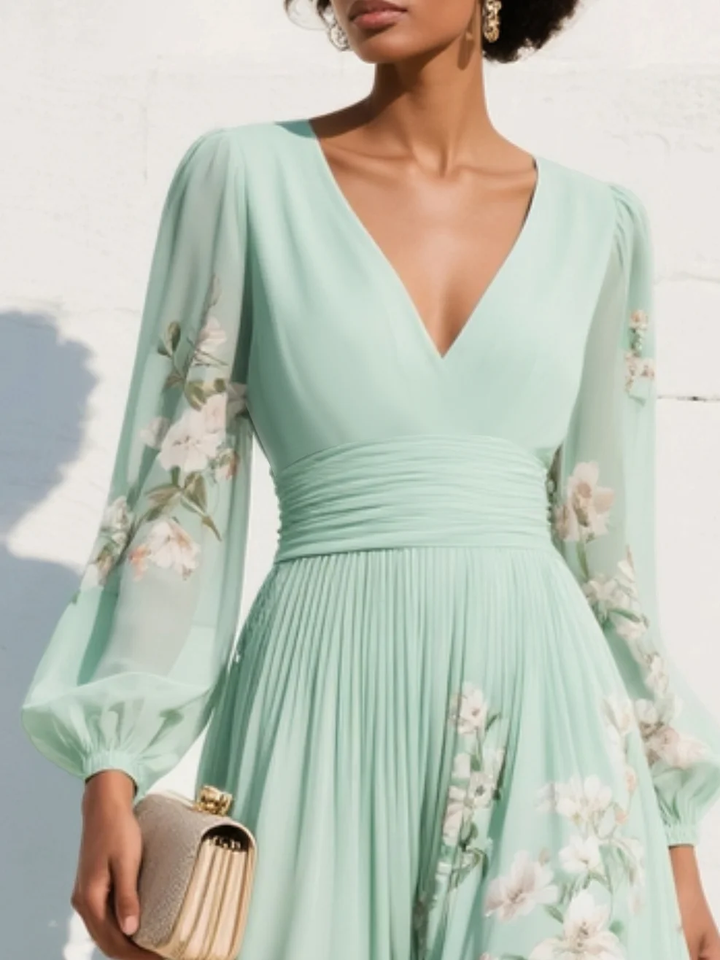 Light green chiffon midi dress with a pleated V-neckline