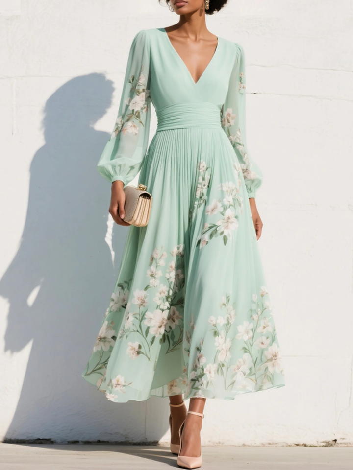 Light green chiffon midi dress with a pleated V-neckline
