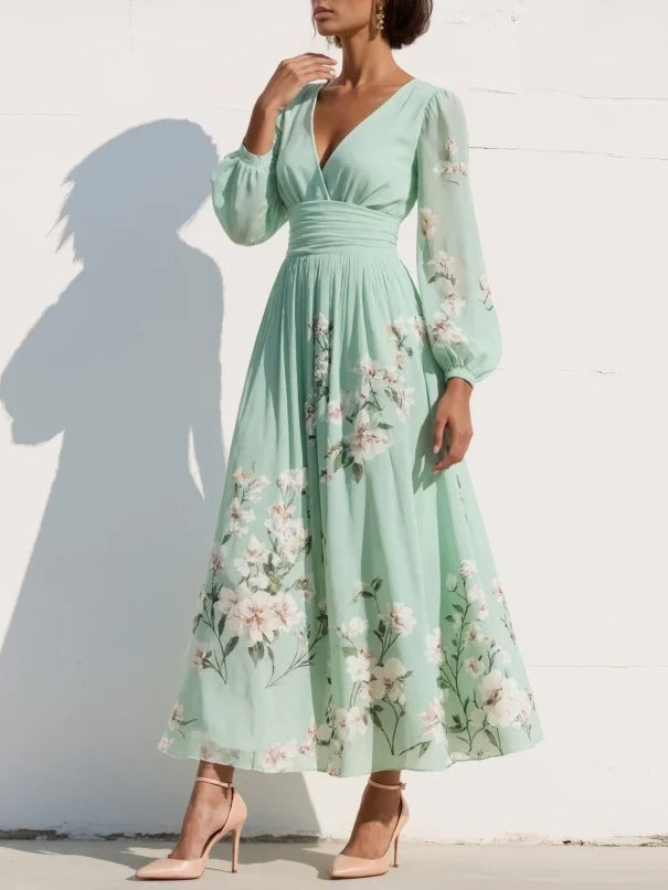Light green chiffon midi dress with a pleated V-neckline